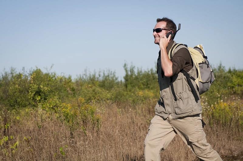 Man using a satellite communicator